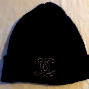 Black cotton small cable knit Chanel beanie. Excellent condition.